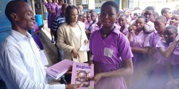 Cross River-Based Philanthropist Gifts English Language Textbooks to Students in Calabar
