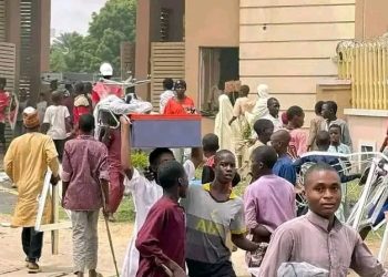 Photo Story: Hoodlums Loot, Burn Nigerian Communications Commission Office In Kano Amid Protests